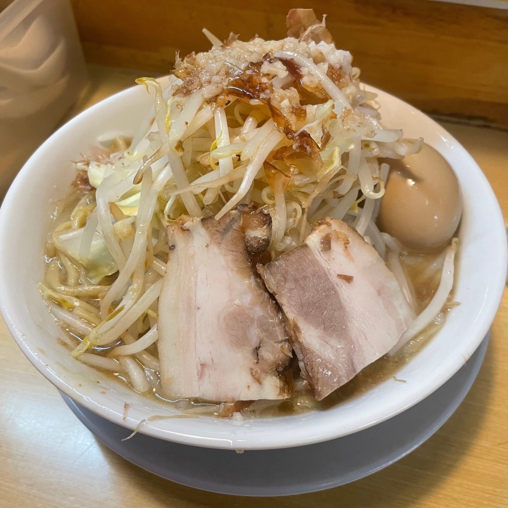 ユーザーが投稿したラーメン半熟煮玉子トッピングの写真 - 実際訪問したユーザーが直接撮影して投稿した梅田ラーメン / つけ麺笑福〇わ 梅田店の写真