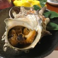 サザエ海鮮焼き - 実際訪問したユーザーが直接撮影して投稿した小倉町居酒屋能登の写真のメニュー情報