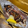 特製イカの丸焼き - 実際訪問したユーザーが直接撮影して投稿した西一条南居酒屋居酒屋とっくりの写真のメニュー情報