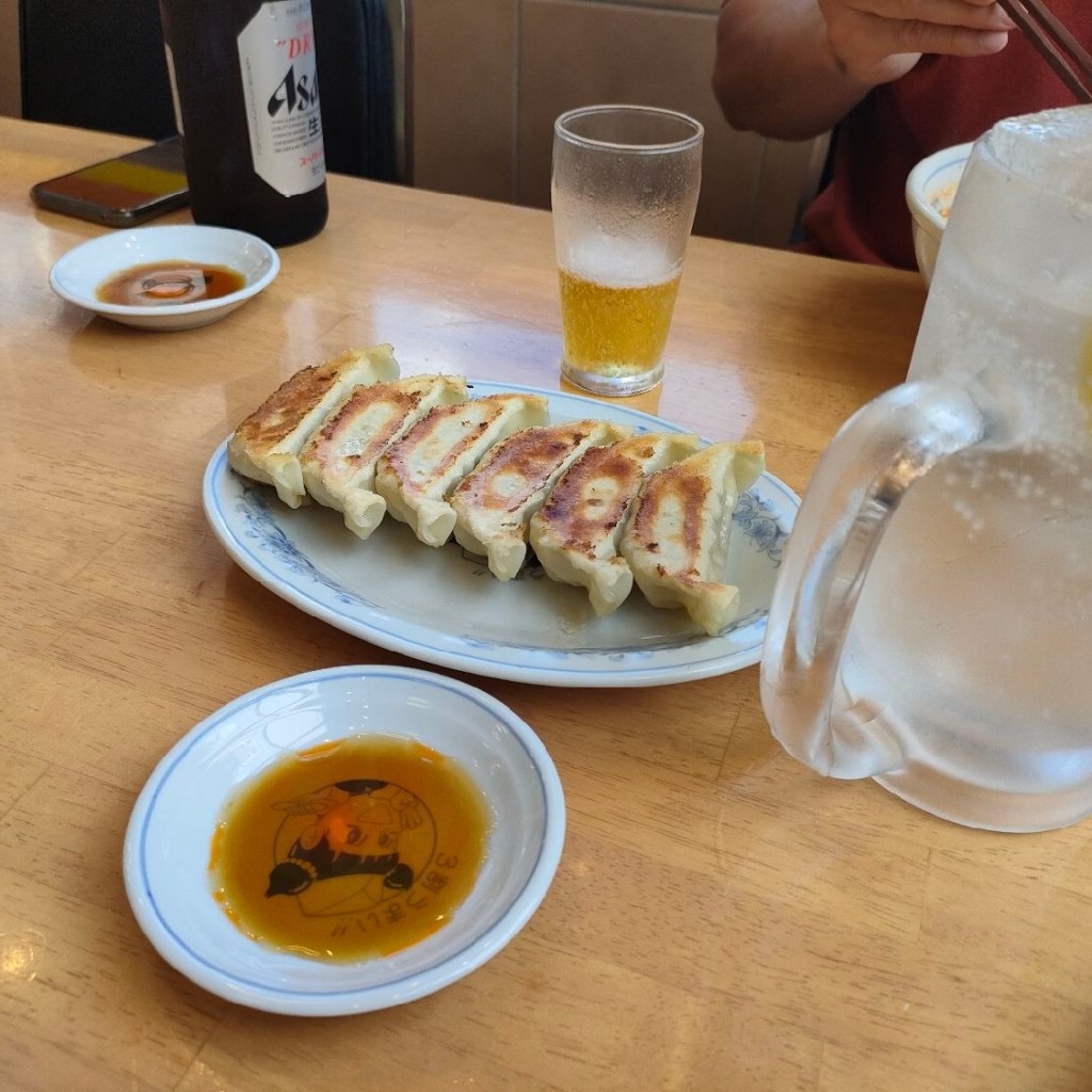 ユーザーが投稿した旨辛菜麺と焼餃子の写真 - 実際訪問したユーザーが直接撮影して投稿した江の木町餃子ぎょうざの満洲 江坂工場直売店の写真
